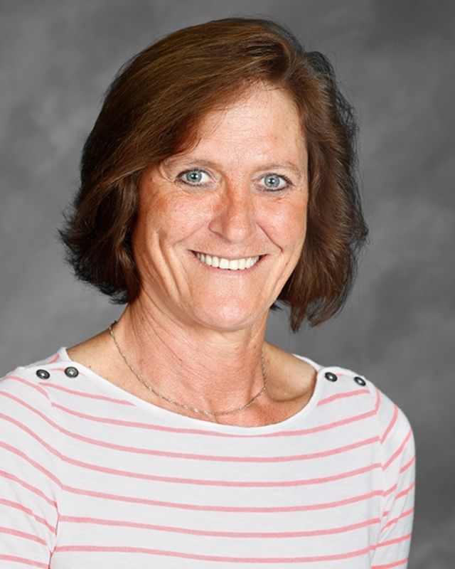 Lisa Schaller, Anthony Wayne Class of 1981, smiling in a professional headshot.