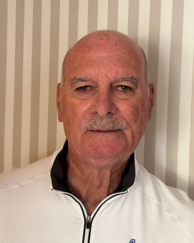 Steve Mossing, 2026 Anthony Wayne Hall of Fame inductee, pictured in a white quarter-zip shirt.